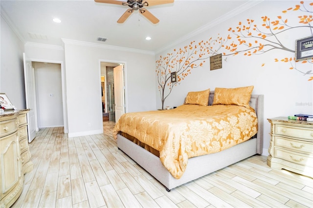 bedroom featuring ornamental molding, connected bathroom, ceiling fan, and light hardwood / wood-style floors