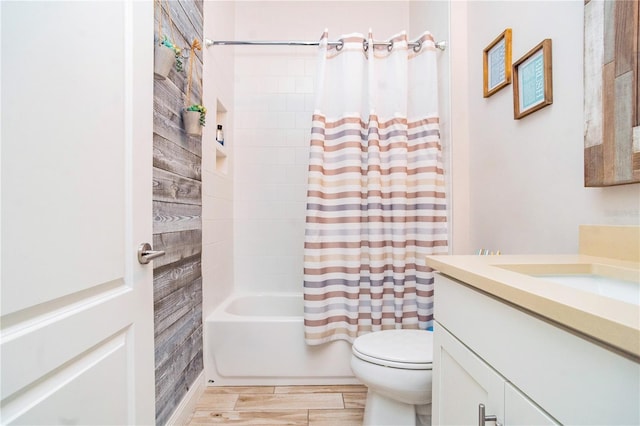 full bathroom featuring vanity, toilet, and shower / bath combo with shower curtain