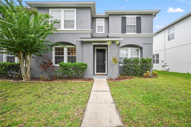 view of front of home with a front yard