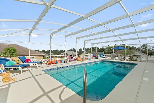 view of pool featuring a lanai and a patio area