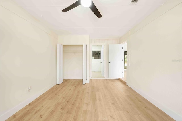 spare room featuring ceiling fan and light wood-type flooring