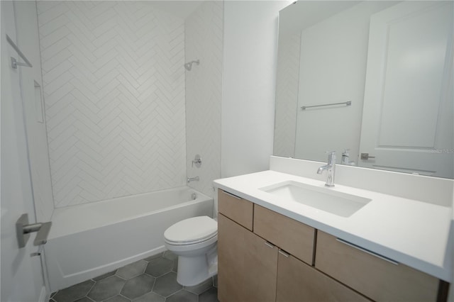 bathroom featuring tile patterned floors, toilet, tub / shower combination, and vanity