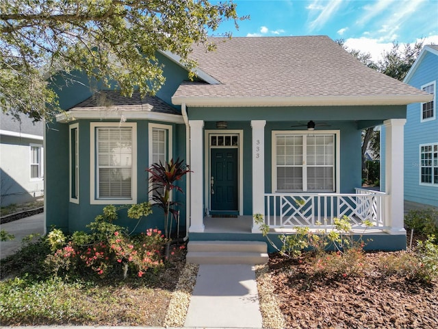 bungalow-style house with ceiling fan and a porch