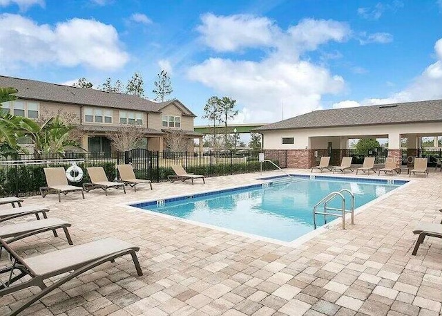 view of pool featuring a patio area