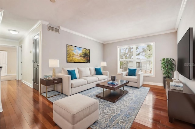 living room with hardwood / wood-style floors and ornamental molding