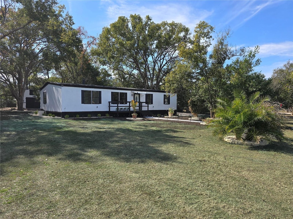 view of front of house with a front lawn