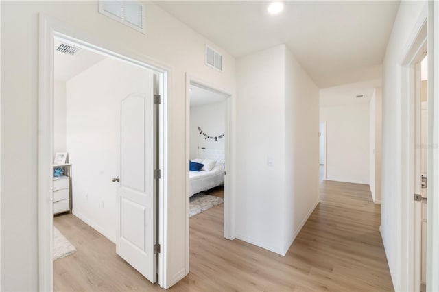 hall featuring light hardwood / wood-style flooring