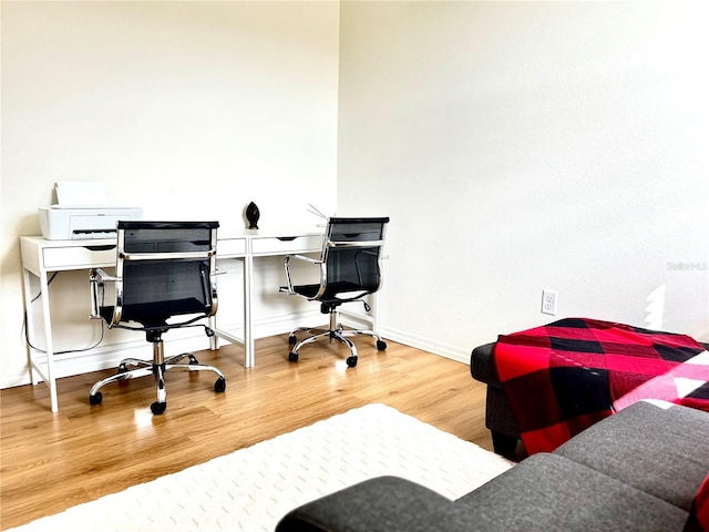 office space with hardwood / wood-style flooring