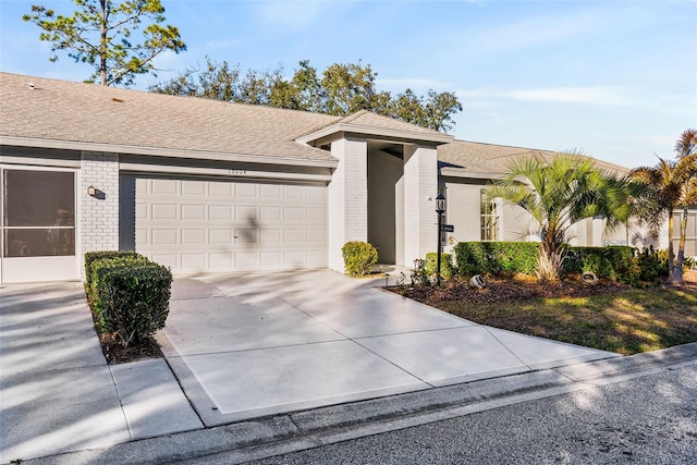 single story home featuring a garage