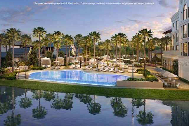 10601 Autumn Mist Ln Unit 302, Golden Oak, FL 32836 - view of pool at dusk