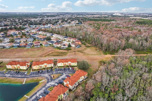 drone / aerial view with a water view