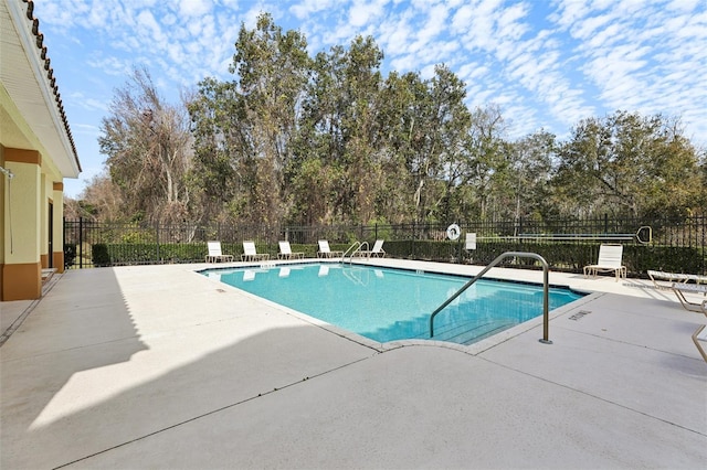 view of pool featuring a patio area