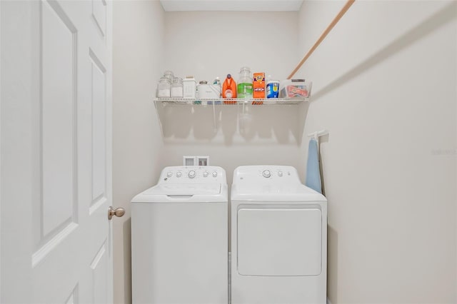 laundry room featuring independent washer and dryer