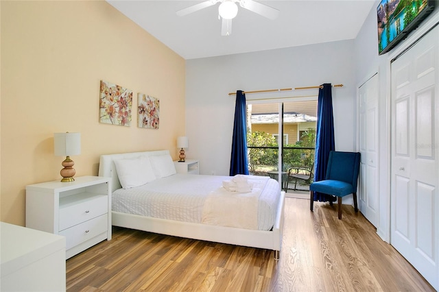 bedroom with hardwood / wood-style floors and ceiling fan