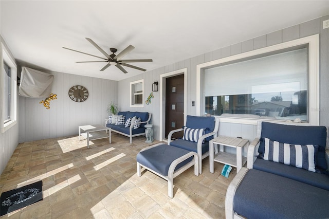 view of patio / terrace with an outdoor living space and ceiling fan