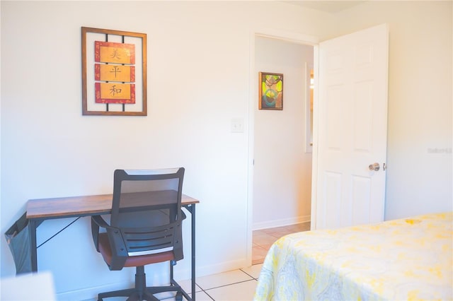 bedroom featuring light tile patterned floors