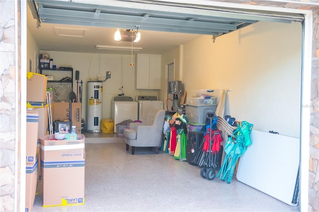 garage with washer and dryer, electric water heater, and a garage door opener