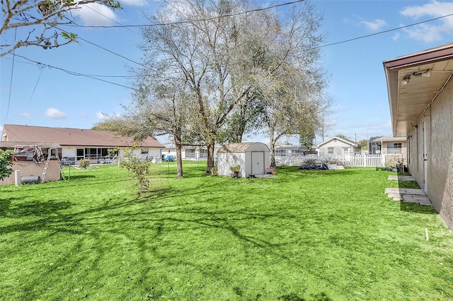 view of yard with a storage shed