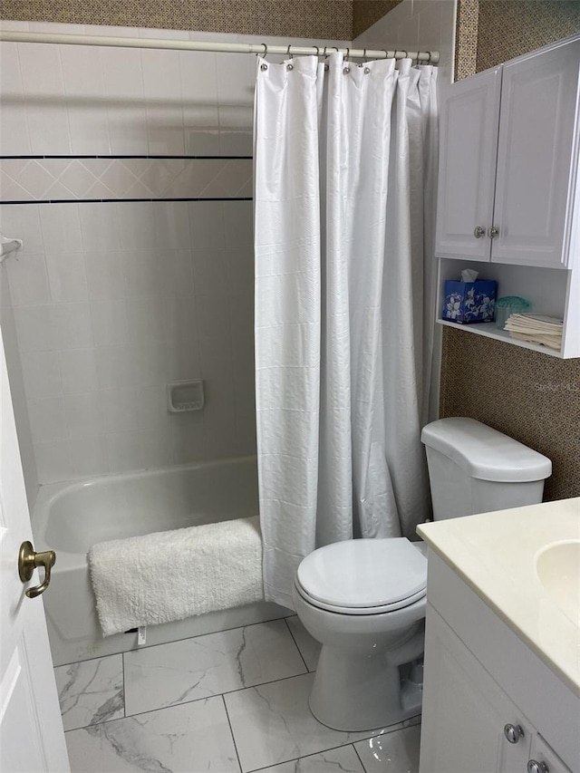 full bathroom with vanity, toilet, and shower / tub combo