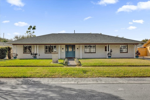 ranch-style house with a front yard