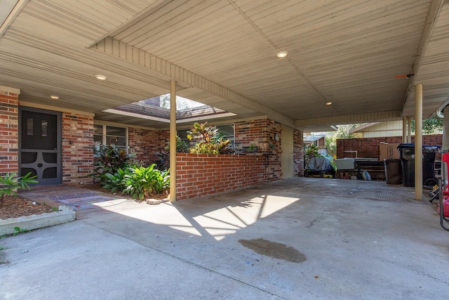 view of patio / terrace featuring a carport