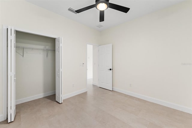 unfurnished bedroom featuring a closet and ceiling fan