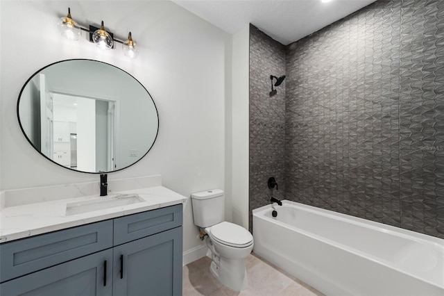 full bathroom with tiled shower / bath, vanity, toilet, and tile patterned floors