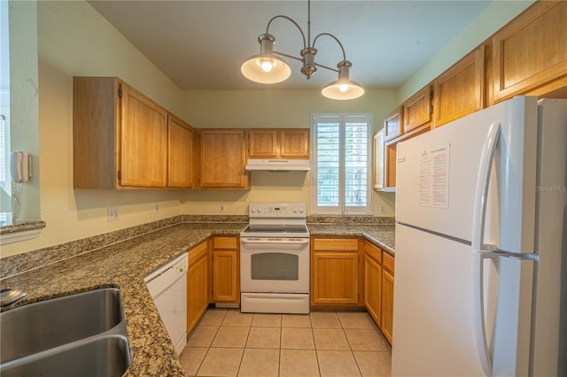 kitchen featuring sink, pendant lighting, white appliances, and light tile patterned floors