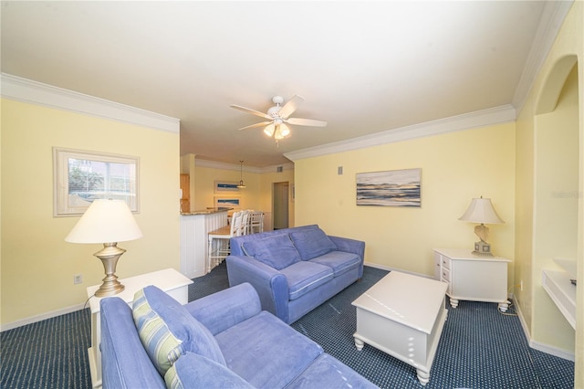 carpeted living room featuring crown molding and ceiling fan