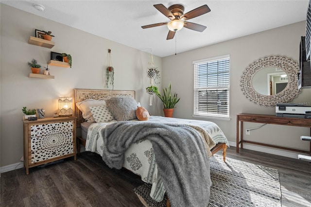 bedroom with dark wood-type flooring and ceiling fan