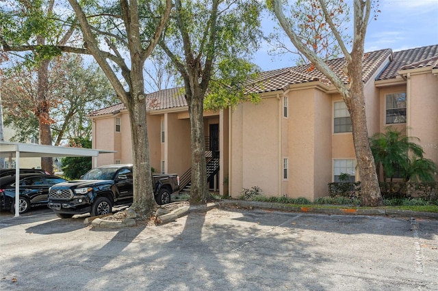 view of property featuring a carport