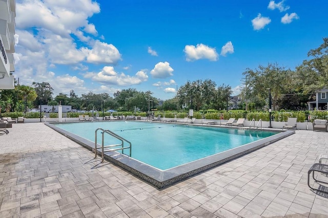 view of pool featuring a patio area