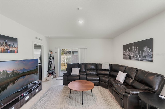 living room with light tile patterned flooring