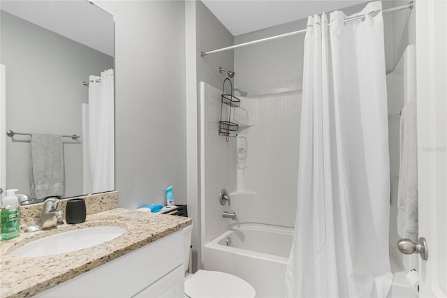 full bathroom with shower / tub combo with curtain, vanity, and toilet