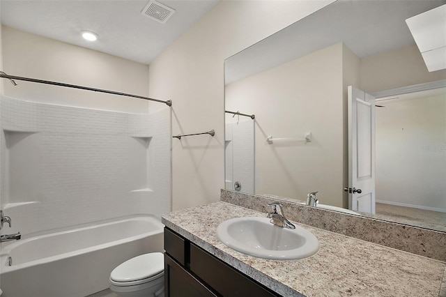 full bathroom featuring vanity,  shower combination, and toilet