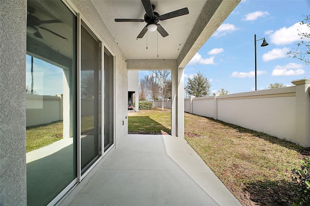 view of patio with ceiling fan