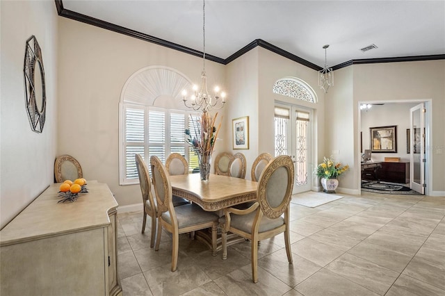 tiled dining space with an inviting chandelier, crown molding, and french doors