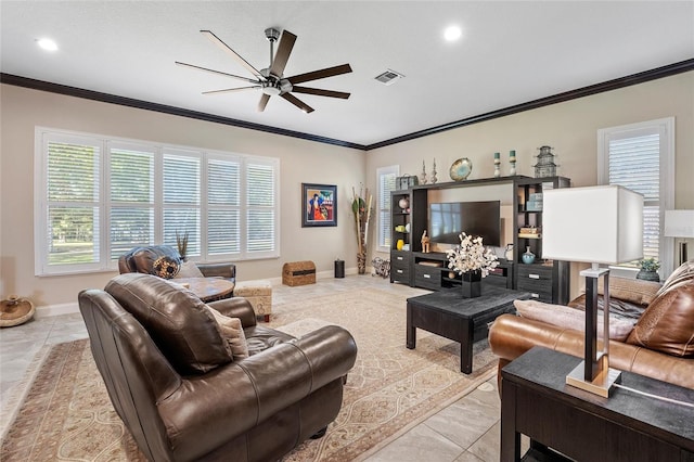 tiled living room featuring ornamental molding and ceiling fan