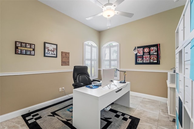 office space with ceiling fan and light tile patterned floors