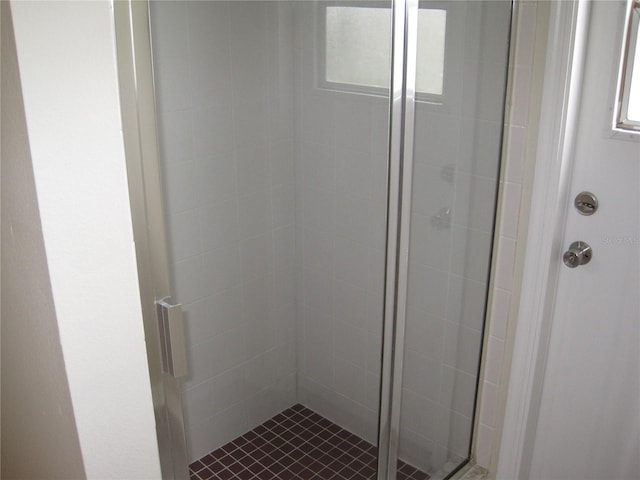 bathroom with a stall shower