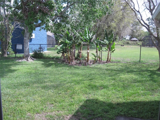 view of yard featuring fence