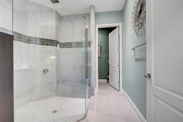 bathroom featuring tile patterned floors and walk in shower