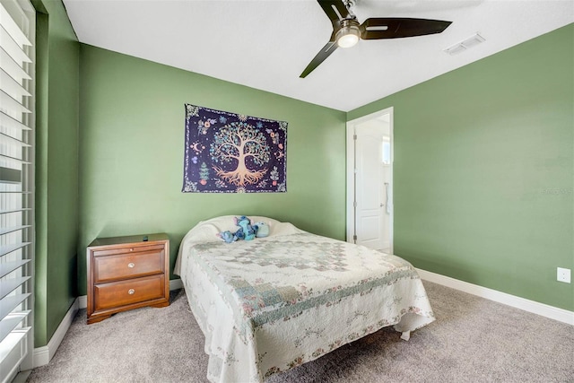 bedroom with light carpet and ceiling fan