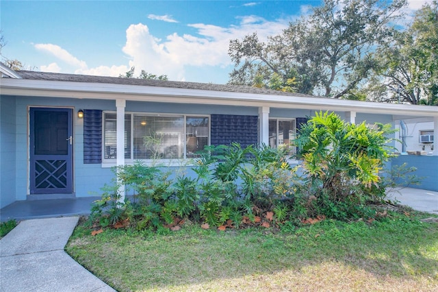 view of front of home with a front yard