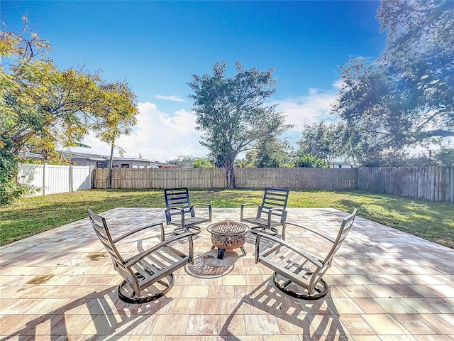 view of patio featuring an outdoor fire pit