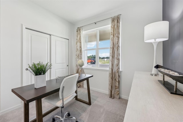 home office featuring light colored carpet