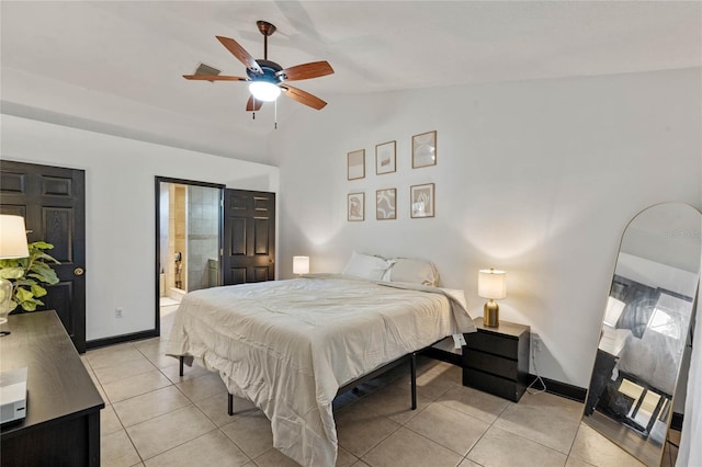 bedroom with light tile patterned flooring, ceiling fan, and lofted ceiling