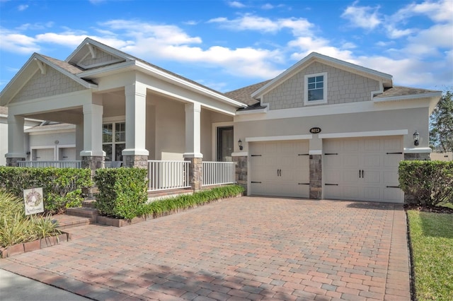 craftsman-style home featuring a garage