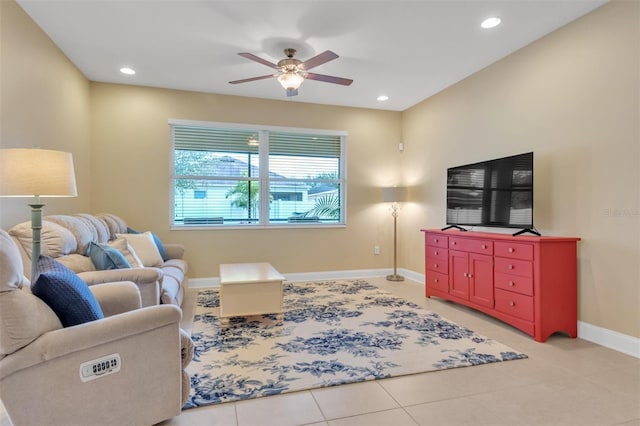 tiled living room featuring ceiling fan