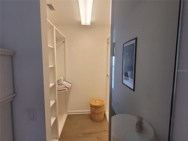 bathroom featuring hardwood / wood-style flooring